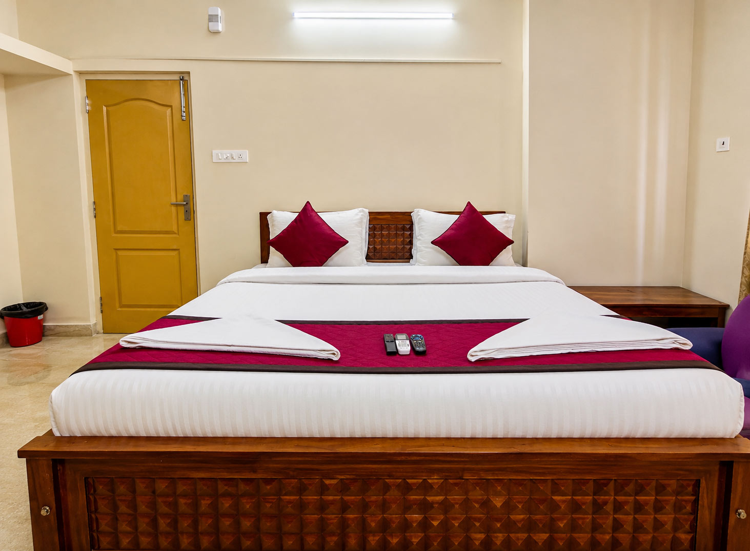 Deluxe Premium AC Room at Honey Bee Boutique Hotel Chennai featuring spacious interiors and premium comfort