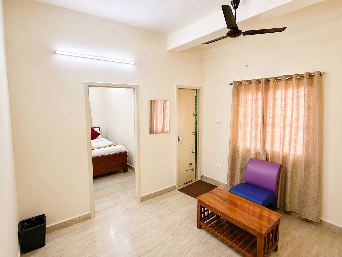 Deluxe Premium Non AC Room at Honey Bee Boutique Hotel Chennai offering spacious stay for families and travelers